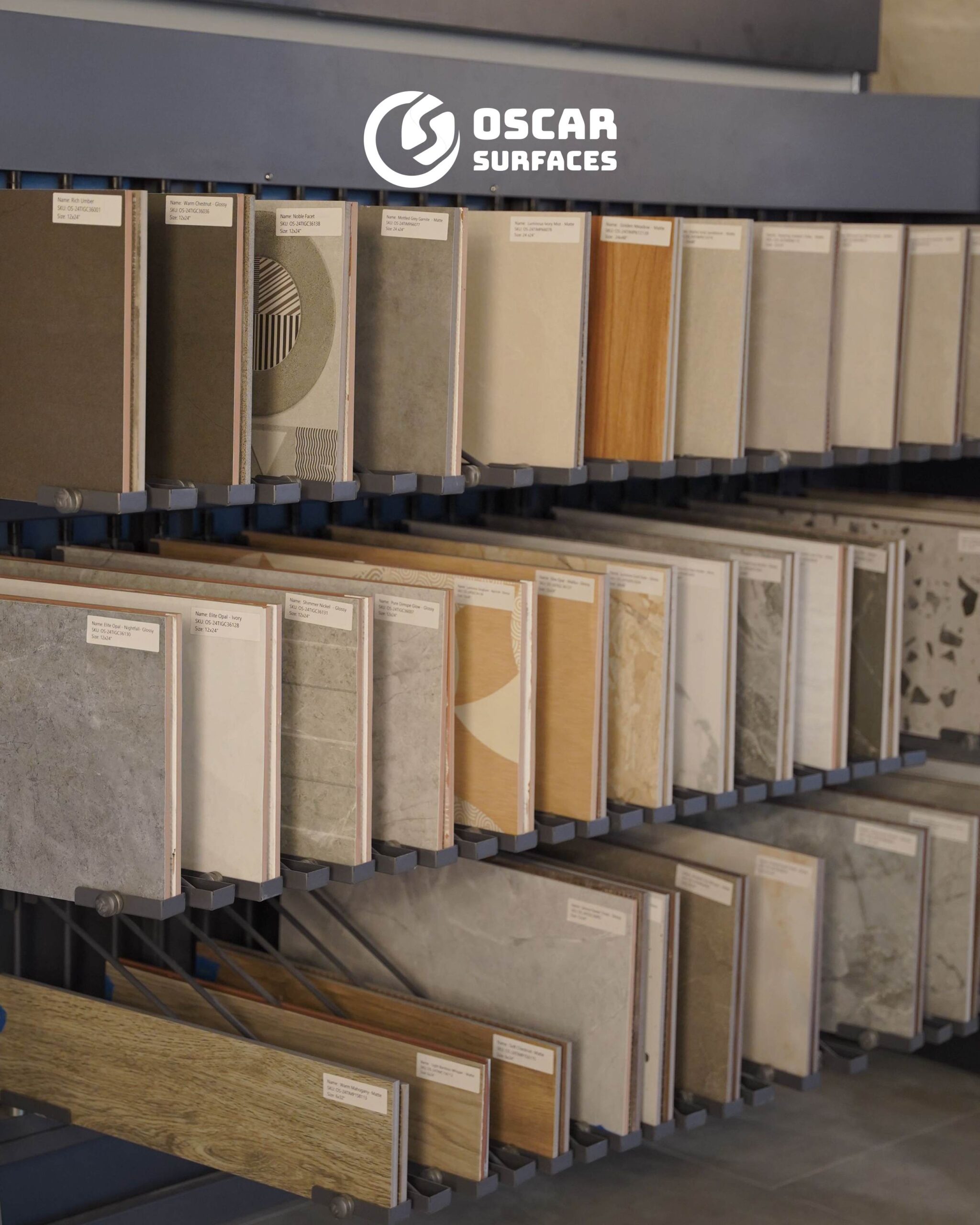 A display rack showcasing a diverse range of floor and wall tile samples from Oscar Surfaces, providing options for new builds and renovations.